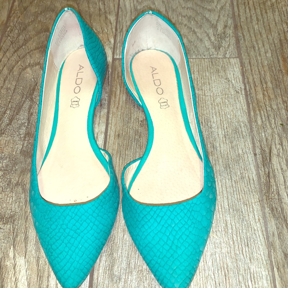 Also teal snake print flats
